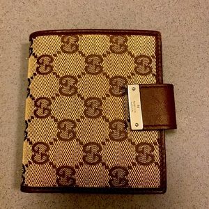 Gucci canvas and leather men’s wallet
